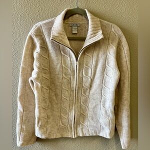 SKYR women’s 100% lambswool zippered sweater.